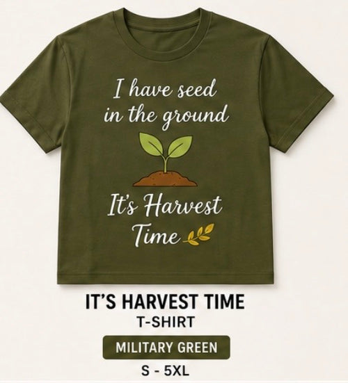 An olive green crewneck t-shirt with a graphic that reads 'I have seed in the ground' and 'It's Harvest Time' around a small sprout illustration. Below the shirt, text reads 'IT'S HARVEST TIME T-SHIRT', 'MILITARY GREEN', and 'S - 5XL'.