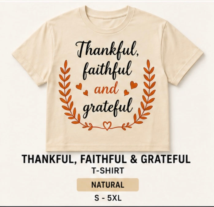 A natural beige short-sleeve t-shirt with a graphic print that reads 'Thankful, faithful and grateful' in black and orange lettering, framed by an orange leaf wreath and small hearts. Below the shirt, text reads 'THANKFUL, FAITHFUL & GRATEFUL T-SHIRT', 'NATURAL', and 'S - 5XL'.