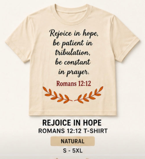 A beige short-sleeve t-shirt with a black typewriter-style quote reading 'Rejoice in hope, be patient in tribulation, be constant in prayer, Romans 12:12' and an orange leaf graphic below. Text underneath the shirt says 'REJOICE IN HOPE ROMANS 12:12 T-SHIRT' and 'NATURAL S - 5XL'.